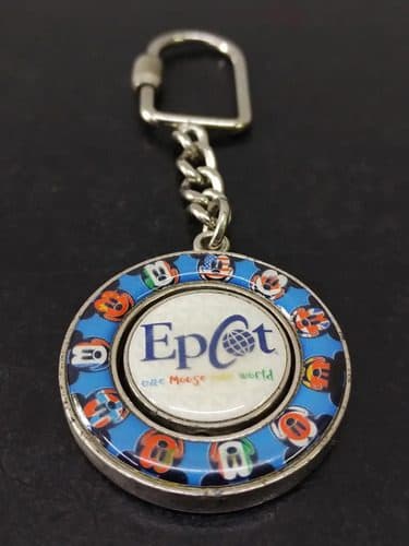 Llavero De Colección Epcot Disney Metálico Giratorio 3.8cm Azul, Rojo Y Blanco — Coleccionables vintage